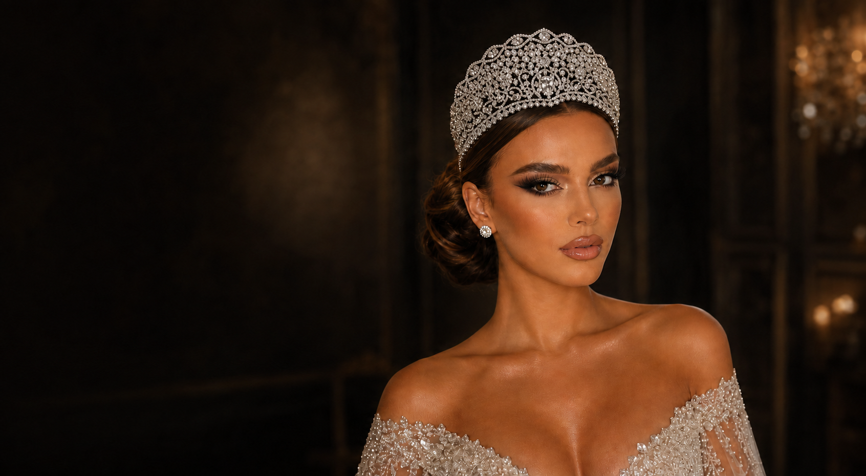 Bride wearing a custom-designed Royauté headpiece and veil